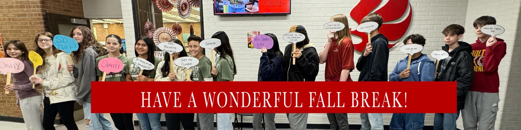 WEB leaders holding signs showing gratitude