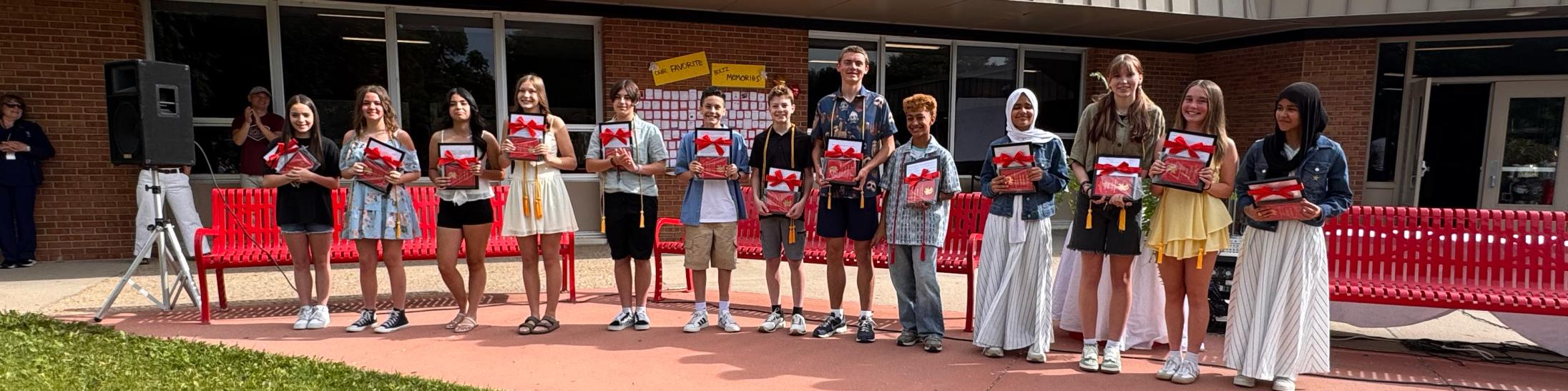 Phoenix award winners in front of the Boltz Building 2026