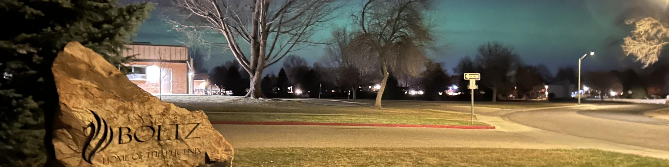 Northern Lights above the Fort Collins horizon, photo by Paige Woodley